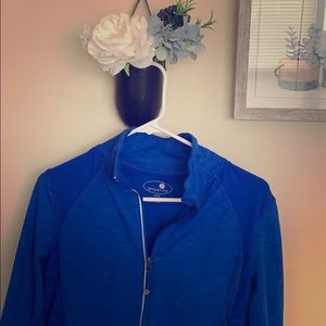Women’s blue zip up athletic top